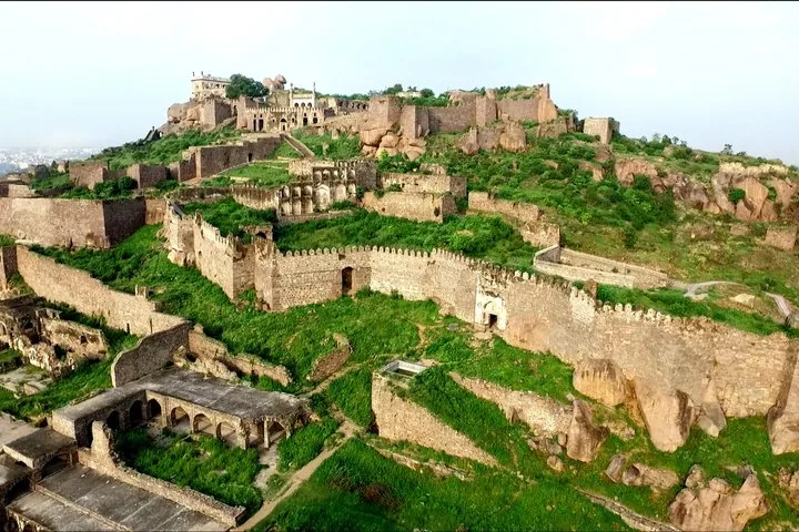 Aerial view of the sprawling stone structures of Golconda Fort